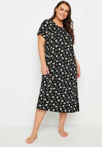 Abito nero al ginocchio con vestibilità ampia, maniche corte e un motivo sparso di cuoricini rosa chiaro e impronte di zampe.