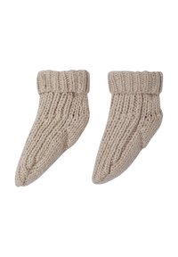 Strickspielzeug für Babys in Beige mit gerippten Bündchen. Verfügt über ein spitz zulaufendes Design und strukturierten Stoff. Weich und dehnbar für zusätzlichen Komfort.