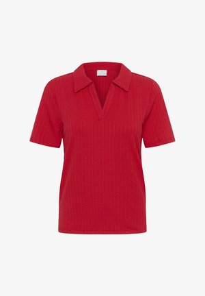 Punainen lyhythihainen polo-paita, joka on valmistettu ribbikankaasta ja jossa on V-kaula-aukko sekä muotoiltu kaulus. Ei lisäkuvioita tai -koristeita.