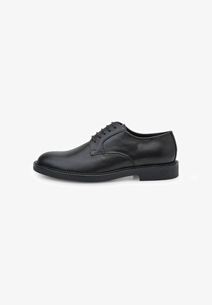 Schwarze Leder-Oxfords mit rundem Zehenbereich, Schnürdesign, glatter Textur und robuster Gummisohle.