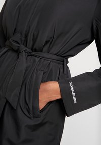 Calvin Klein Jeans Pitkä takki - black