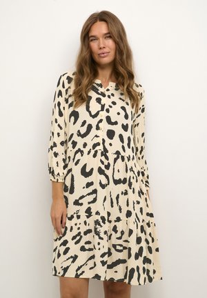 Leopardenmuster-Kleid in Creme und Schwarz, mit einem knopfbaren Vorderteil, langen Ärmeln und einem gestuften Rockdesign mit lockerer Passform.