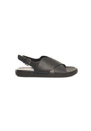 Schwarze Leder-Sandalen mit Kreuzriemen und Slingback-Design. Flacher Boden mit strukturiertem Gummi für besseren Halt. Verstellbarer Riemen für die Passform.