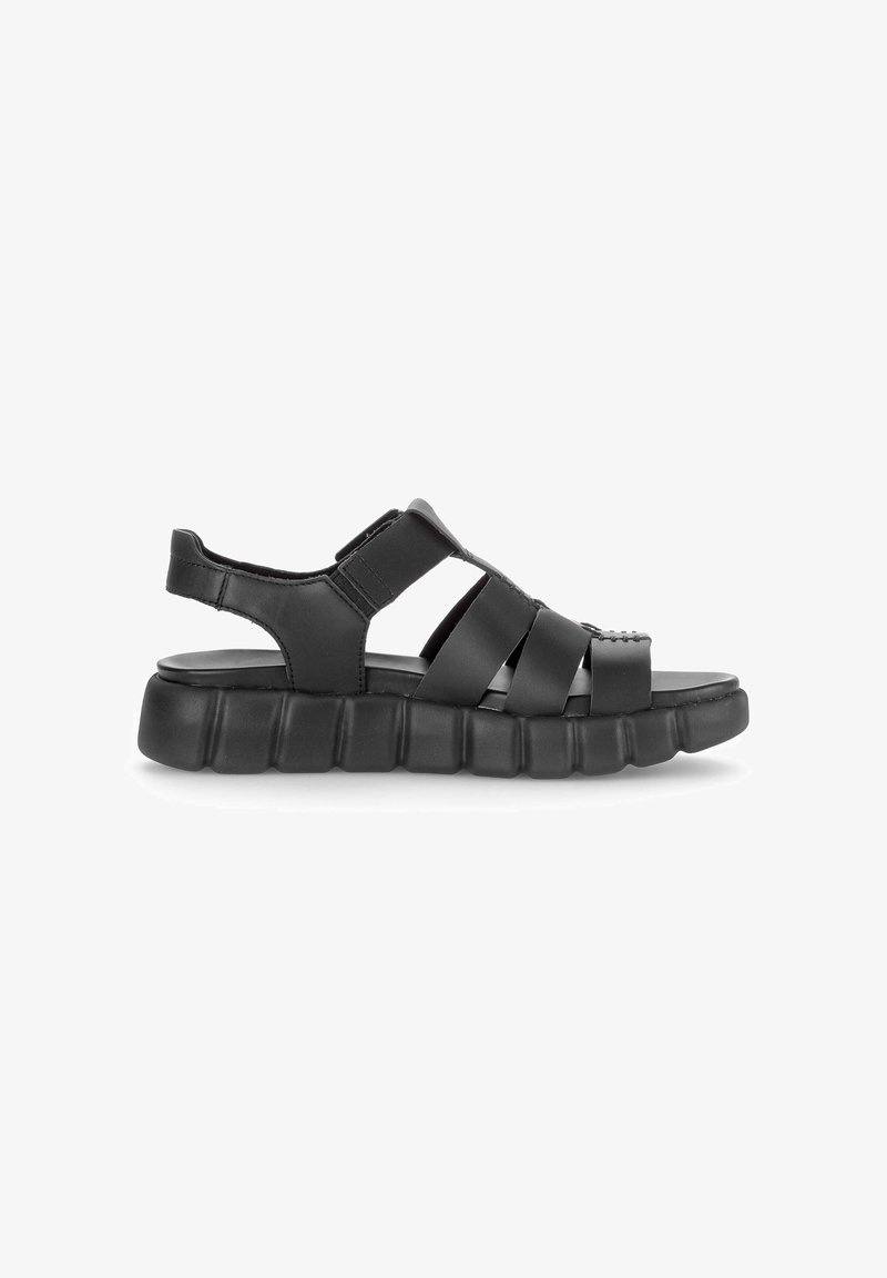 Black men's sandal with thick cushioned sole, open toe design, multiple straps, and adjustable ankle closure on white background.