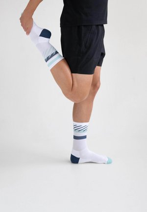 RUNNING DISRUPTS - Sports socks - navy blue mint