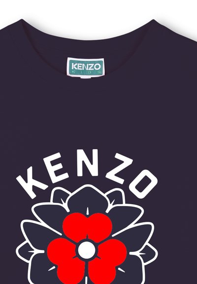 Navy blue t-shirt featuring a large red and white floral print with the word "KENZO" in bold white letters above the design. Cotton material.