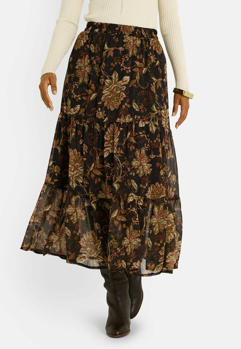 Jupe maxi noire à fleurs avec trois volants, ornée de motifs floraux verts et bordeaux. Fabriquée dans un tissu léger et fluide.