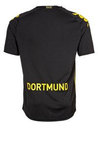 Mustapohjainen urheilupaita keltaisin yksityiskohdin. Ominaisuuksina pyöreä kaula-aukko, lyhyet hihat ja "DORTMUND" painettuna selässä paksuilla keltaisilla kirjaimilla.
