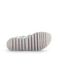 Shoe outsole with a textured grey rubber sole, featuring horizontal grooves and a subtle logo imprint at the heel. Smooth finish.