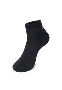 Schwarze Knöchelsocke mit einer gerippten Textur, elastischem Bündchen und abgerundeter Spitze. Verfügt über ein dezentes Logo an der Seite.