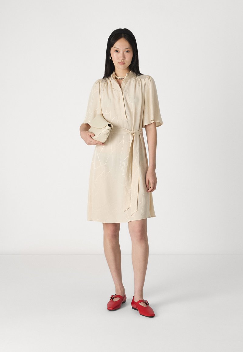 beige color dress casual Beige Ribbed Button Front Mini Dress