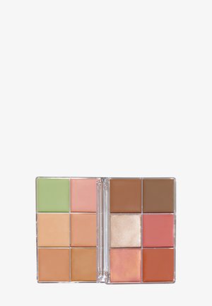 Palette cosmetica quadrata con 12 sezioni. I colori includono verde, pesca, marrone e rosa. Texture cremosa, involucro trasparente e finitura liscia.