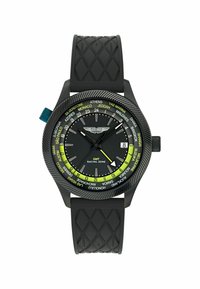 Reloj de pulsera de caucho negro con una detallada esfera negra, acentos verdes y un bisel giratorio que muestra nombres de ciudades. Función GMT incluida.