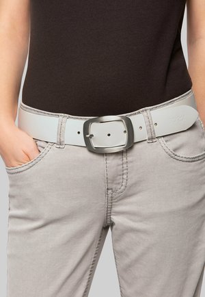 White leather belt with a silver rectangular buckle, worn over gray pants. Features visible stitching and a logo embossed on the belt.