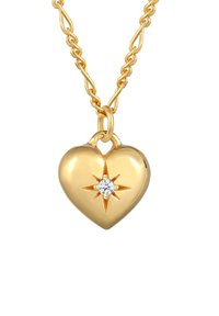 Pendente a forma di cuore in oro con un diamante centrale e un motivo a raggio di sole, sospeso a una catena d'oro attorcigliata.