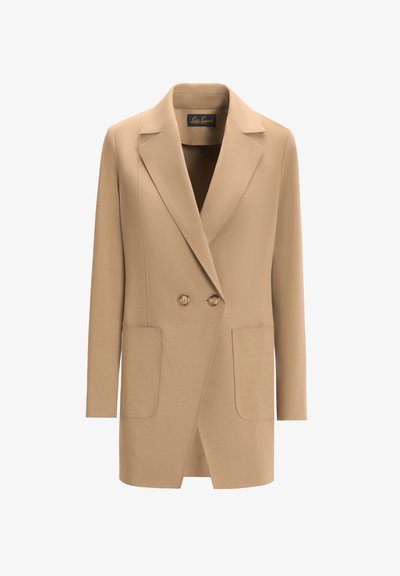 Gaišbrūns žakete ar divrindas priekšpusi, spilvenu pleciem un divām lielām ieliktām kabatām. Gluda auduma ar piegriezumu, kas lieliski pieguļ.