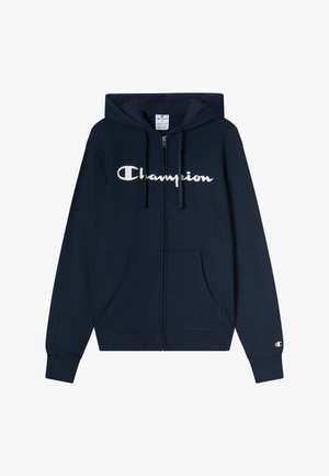 Granatowa bluza z kapturem zapinana na zamek, z dużym białym logo "Champion" na piersi, dwoma przednimi kieszeniami i kapturem ze sznurkiem. Miękki materiał i ściągacze przy rękawach.