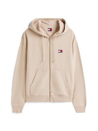 Felpa beige con zip realizzata in tessuto misto cotone. Presenta una grande tasca frontale, polsini a costine e una toppa con logo sul petto. Design con cappuccio.