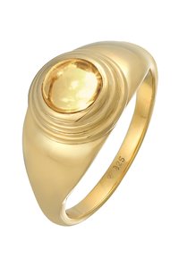 Goldfarbiger Ring mit einem polierten runden gelben Stein in der Mitte. Glattes, gewölbtes Design mit einer breiten Band und eingraviertem 925 Zeichen.