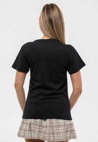 Paradiso Clothing ELTON JOHN DIAMANTE IN CONCERT - Print T-shirt - black