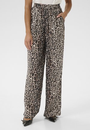 Hosen mit Leopardenmuster im weit geschnittenen Design, leichtes Material, elastischer Bund, seitliche Taschen, neutrale Beige- und Brauntöne mit schwarzen Akzenten.