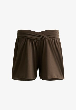 Pantaloni corti marroni realizzati in tessuto morbido con una cintura elastica. Design avvolgente intorno alla vita e gambe ampie. Texture liscia.