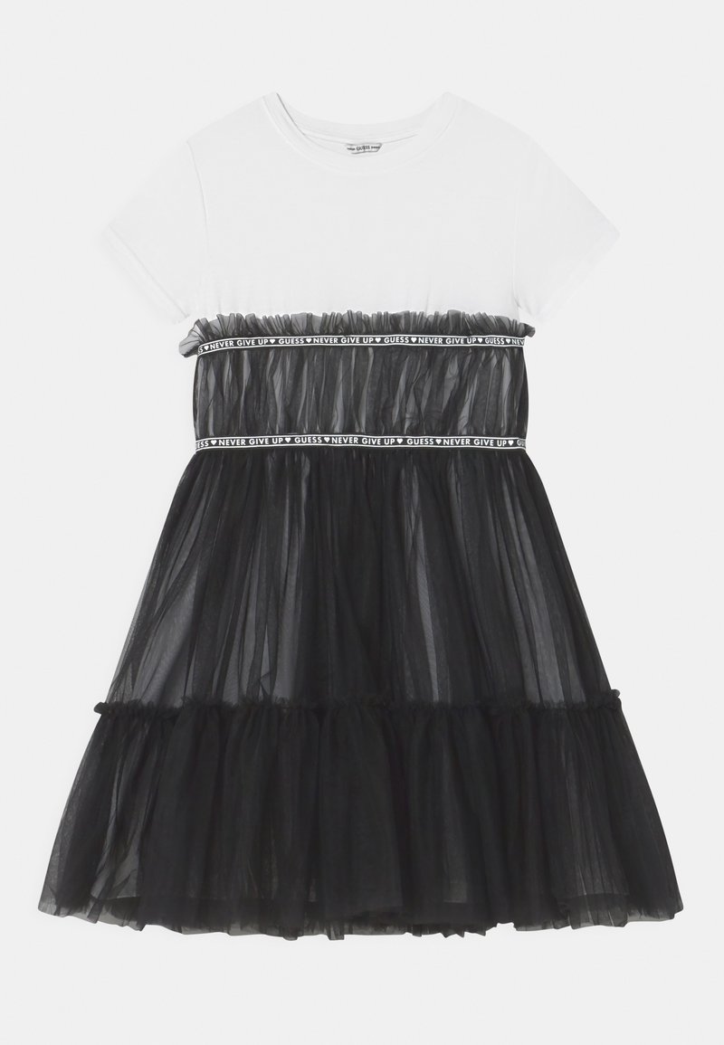 Vestito in tulle nero con top bianco, caratterizzato da una vita arricciata, fascia elastica a contrasto con testo e gonna a balze sovrapposte.