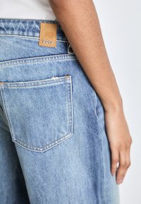 BOSS CROSSROAD SUPER - Wide leg - open blue