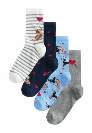 Four pairs of socks: white striped, navy with hearts, light blue with dog designs, and solid gray; various textures and playful patterns.