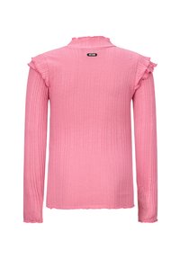 Top a maniche lunghe in rosa chiaro con costine, con collo e polsini a volant. Presenta un'etichetta sul retro con il nome del marchio "RETOUR."