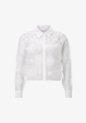 Witte doorschijnende blouse met lange mouwen, geborduurd bloemmotief, knoopsluiting aan de voorkant, klassieke kraag en geruite manchetten.