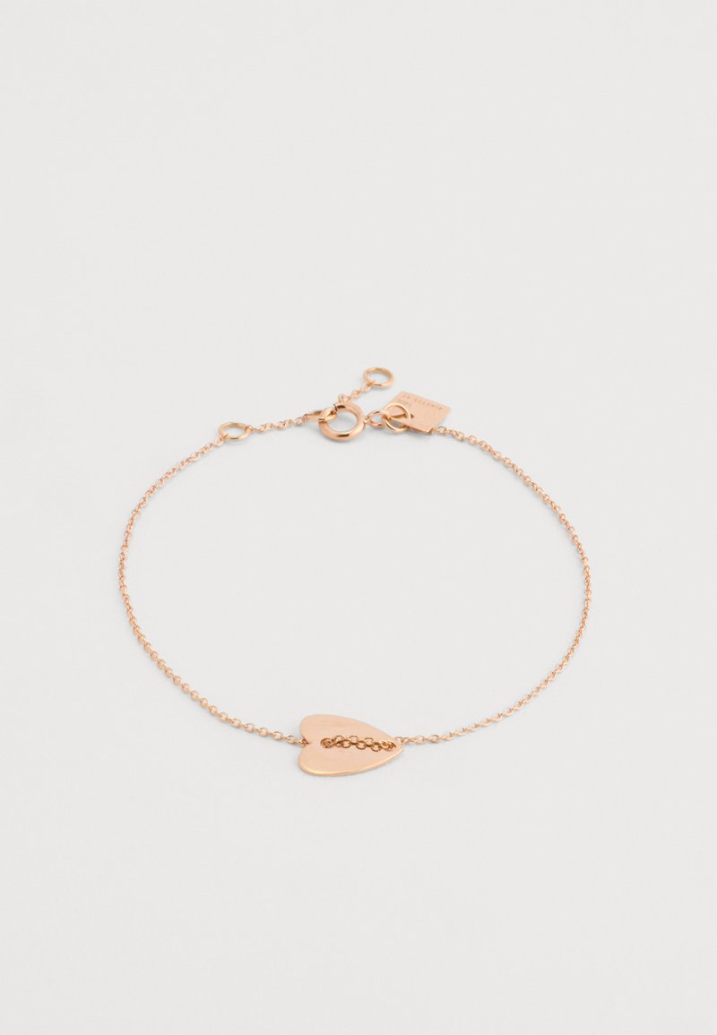 Rožinio aukso apyrankė, turinti subtilią grandinėlę ir širdelės formos pakabuką su tekstūruotu raštu centre. Reguliuojama sagtis.