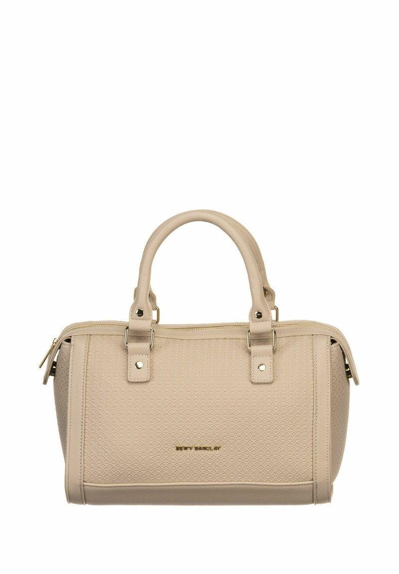 Sac à main beige avec extérieur texturé, double poignée, quincaillerie couleur or et fermeture éclair supérieure. Présente un logo à l'avant.