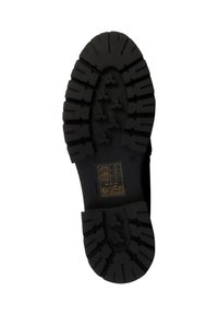 Suola di scarpa in gomma nera con scanalature profonde e motivi triangolari. Presenta un'etichetta dorata con simboli e taglia "10" vicino all'area del tallone.