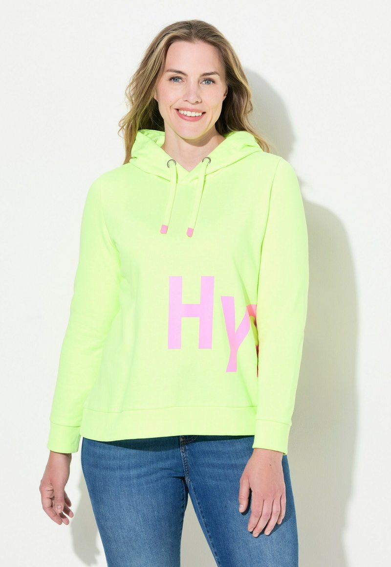Limoengroene hoodie met een capuchon en roze letters "Hy", met trekkoorden en een ontspannen pasvorm. Zacht materiaal en ribgebreide manchetten.