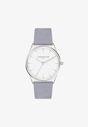 Ronde horloge met een zilveren metalen kast, witte wijzerplaat, grijze leren band en minimalistische uurmarkers. Beschikt over een eenvoudig, elegant ontwerp.