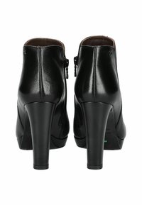 Bottines en cuir noir avec talons hauts, dotées d'une fermeture éclair et d'une texture lisse. Design minimaliste sans embellissements visibles.