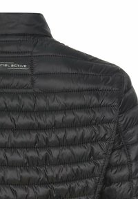 Black puffer jacket featuring a quilted texture, lightweight material, and a high collar. Includes a small logo on the back.
