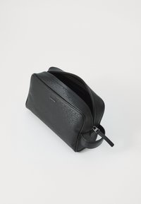 Calvin Klein SLEEK WASHBAG MONO - Toalettmappe - industrial mono black
