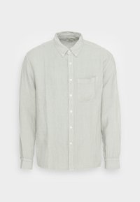 Jasnoszara lniana koszula z długim rękawem z kołnierzykiem zapinanym na guziki, przednią kieszenią i białymi guzikami. Miękka tekstura z luźnym krojem.