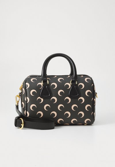 Structured handbag in black with pink crescent pattern, featuring two handles, a detachable strap, and gold hardware accents.
