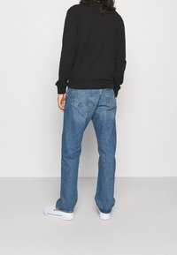 Weekday Džíny Straight Fit - blue