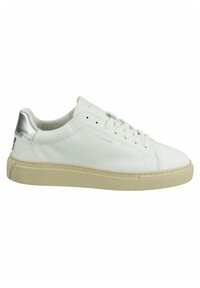 White leather sneaker with a smooth texture, beige rubber sole, and a metallic silver accent on the heel. Features traditional lacing.