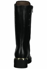 Black leather knee-high boot with a zip closure, silver hardware accents, and a textured finish. Short, chunky heel.