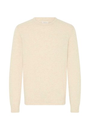 Suéter beige claro hecho de una suave tela de punto, con un escote redondo y mangas largas, y con puños y dobladillo acanalados.