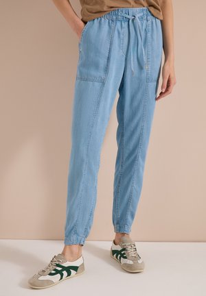 Cecil MID WAIST SLIM LEG HOSE IM WASHED-LOOK - Jeans Tapered Fit - light blue wash