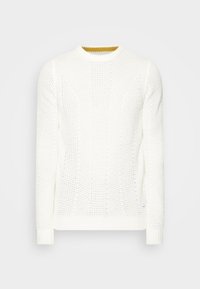Witte gebreide trui met een textuurpatroon, ronde hals, lange mouwen en een contrasterende gele binnenkraag. Ribgebreide manchetten en onderrand.