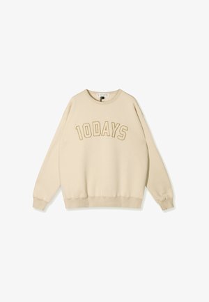 Beige sweatshirt met ronde hals en lange mouwen. Voorzien van de tekst "10DAYS" in een iets donkerdere schaduw geborduurd over de voorkant.