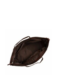 Sac en cuir marron avec un intérieur spacieux, doté d'une doublure en tissu matelassé, d'un compartiment zippé et de poignées doubles.