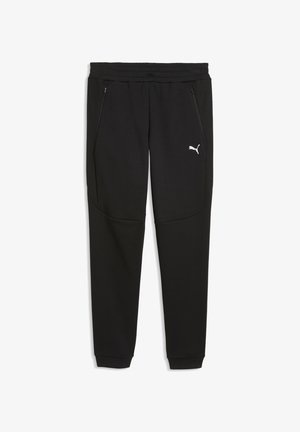 Pantalon de survêtement noir de la marque Puma avec taille élastique, poches latérales zippées et logo Puma blanc près de la poche gauche.